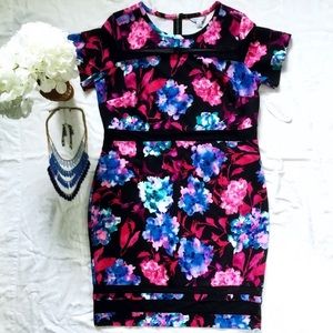 Black floral body con dress with sheer cut outs